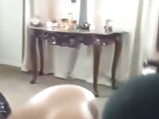 Two big booty black trannies fuck their masked slave